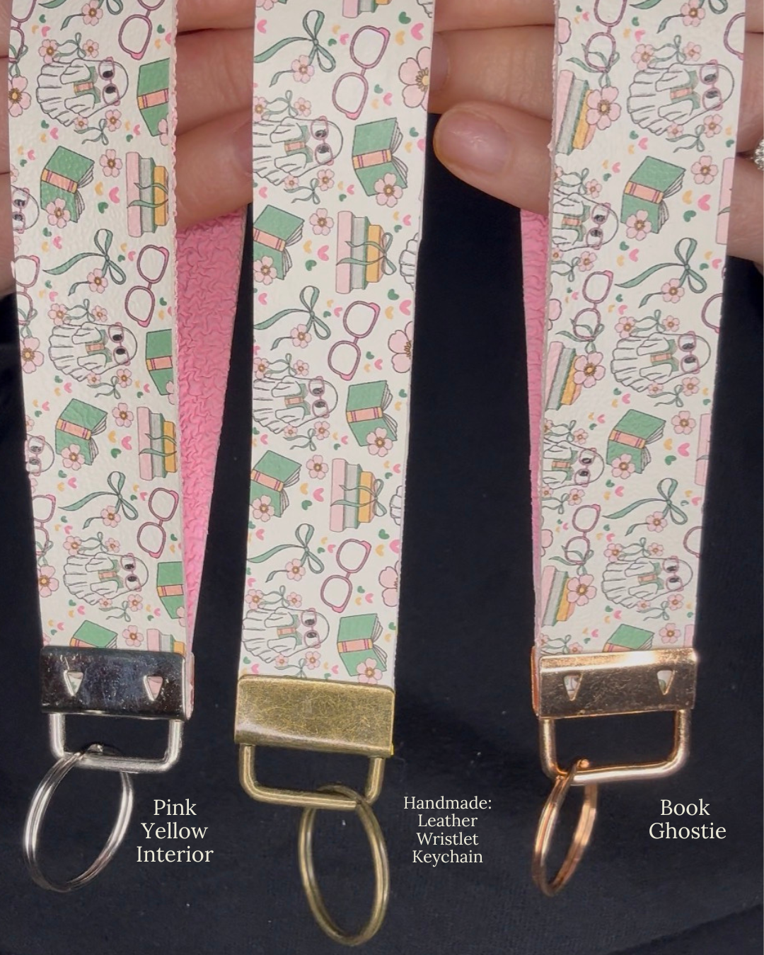 Three Keychain wristlets with books and ghosts on them