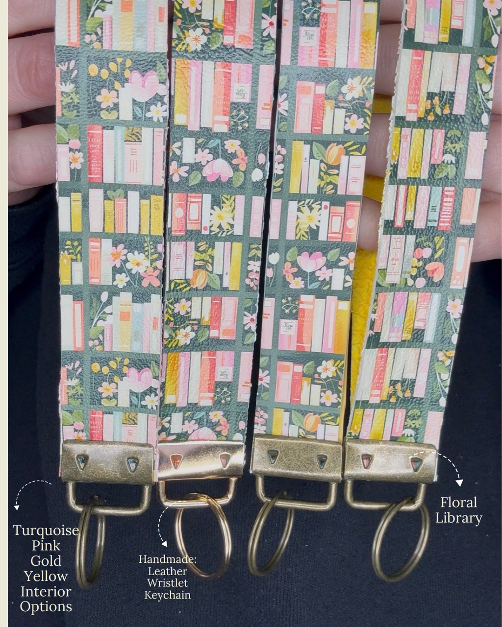 Set of keychains with floral and book pattern on a dark background